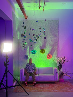 Colorful art installation and photo lounge with studio lighting