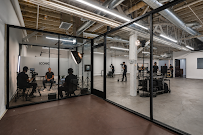 Glass-walled creative offices adjoining the main floor