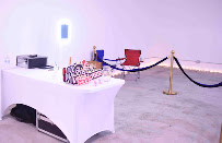 Check-in table with stanchions at the venue entrance