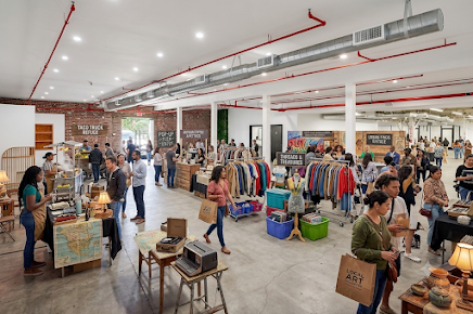 Vendor market and pop-up activation inside the open floor plan