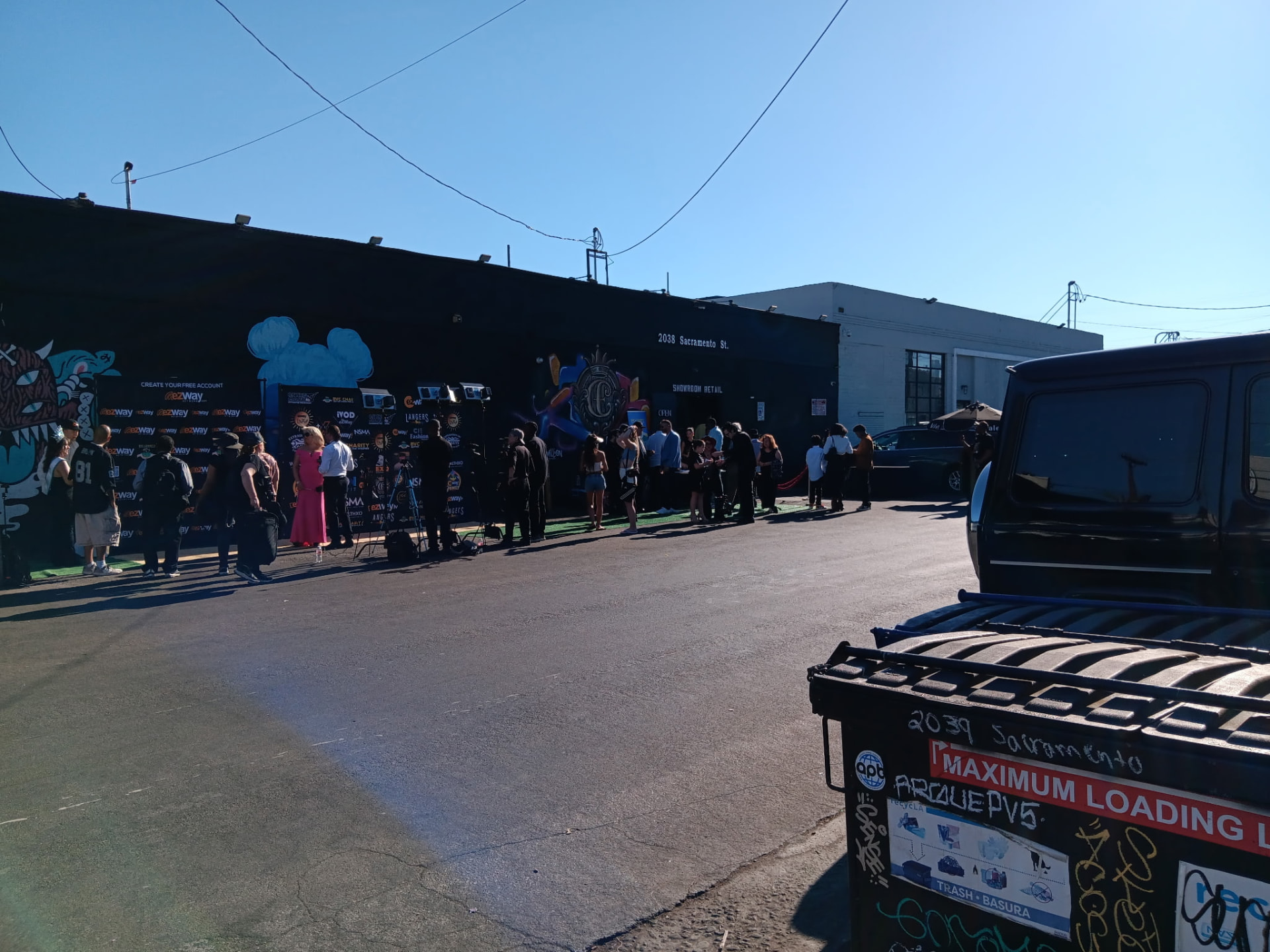 Red carpet arrivals and step-and-repeat outside 2038 Sacramento St.