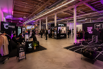 Branded night market activation with black vendor booths